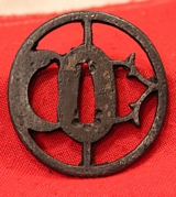 An Edo O Sukashi Wakazashi or Tanto Tsuba In Iron