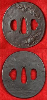 A Nice Edo Period Round Iron Plate Tsuba Decorated with A Boy Riding a Water Buffalo