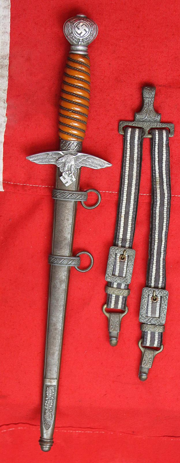 A Very Good WW2 Pilot's Luftwaffe Dagger With Hanging Straps. When Mark Hawkins Met General Adolf Galland, He Confirmed The Pommel + Crossguard of the Luftwaffe Dagger Was Made From Messerschmitt Alloy