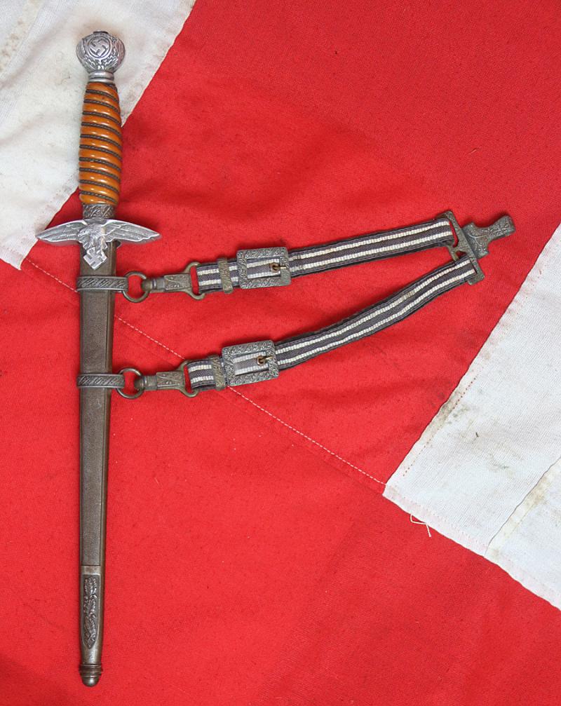 A Very Good WW2 Pilot's Luftwaffe Dagger With Hanging Straps. When Mark Hawkins Met General Adolf Galland, He Confirmed The Pommel + Crossguard of the Luftwaffe Dagger Was Made From Messerschmitt Alloy