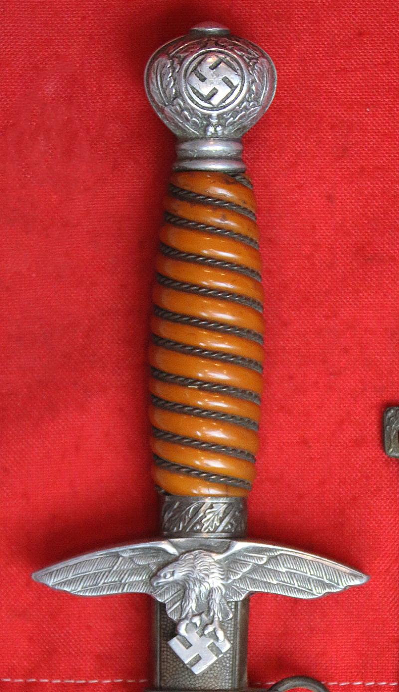 A Very Good WW2 Pilot's Luftwaffe Dagger With Hanging Straps. When Mark Hawkins Met General Adolf Galland, He Confirmed The Pommel + Crossguard of the Luftwaffe Dagger Was Made From Messerschmitt Alloy