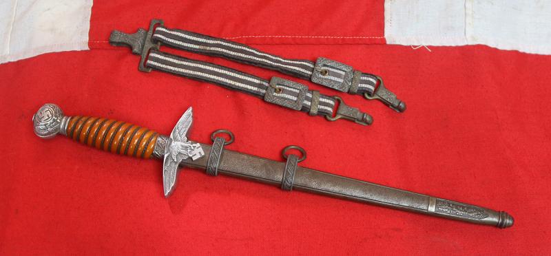 A Very Good WW2 Pilot's Luftwaffe Dagger With Hanging Straps. When Mark Hawkins Met General Adolf Galland, He Confirmed The Pommel + Crossguard of the Luftwaffe Dagger Was Made From Messerschmitt Alloy