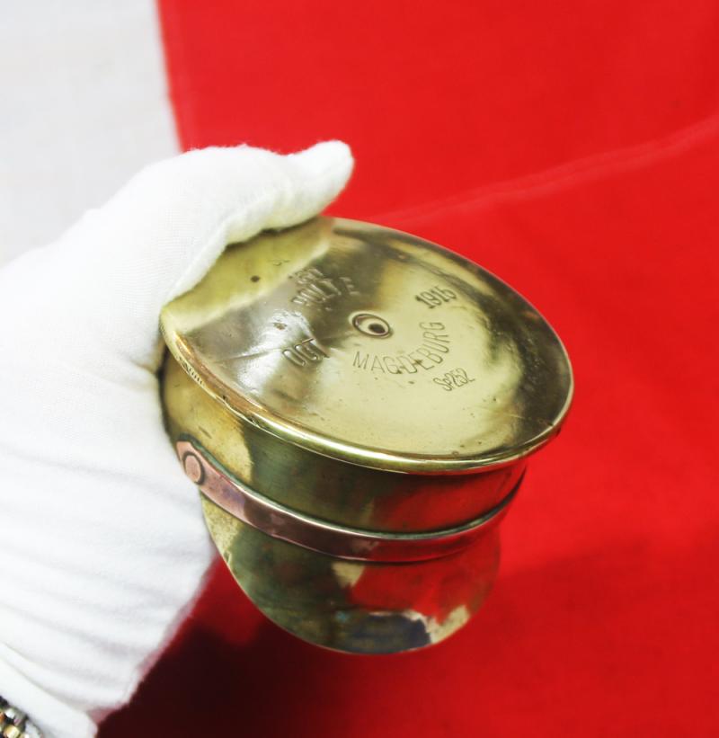 A Delightful Piece of Large Quality 'Trench Art'. A German Shell Trench Engineered Into The Form Of A British 1905 Pattern Trench Service Cap. Wonderful Quality