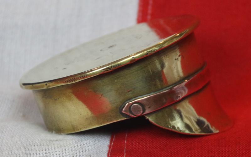 A Delightful Piece of Large Quality 'Trench Art'. A German Shell Trench Engineered Into The Form Of A British 1905 Pattern Trench Service Cap. Wonderful Quality
