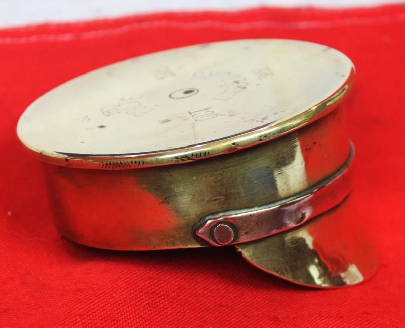 A Delightful Piece of Large Quality 'Trench Art'. A German Shell Trench Engineered Into The Form Of A British 1905 Pattern Trench Service Cap. Wonderful Quality