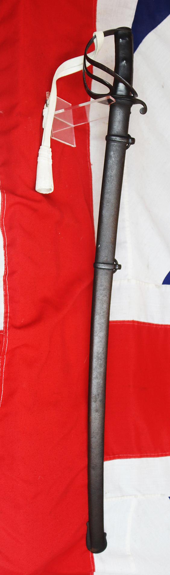 A Superb Crimean War 1853 Issue Pattern British Cavalry Sabre, Exactly as Used by The Charge of the Light Brigade, and, The {Less Well Known, Yet Ironically More Successful} Charge of the Heavy Brigade. In Its Original Scabbard, With White Buff Hide Knot.