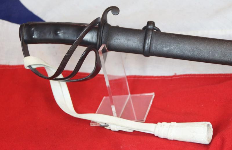 A Superb Crimean War 1853 Issue Pattern British Cavalry Sabre, Exactly as Used by The Charge of the Light Brigade, and, The {Less Well Known, Yet Ironically More Successful} Charge of the Heavy Brigade. In Its Original Scabbard, With White Buff Hide Knot.