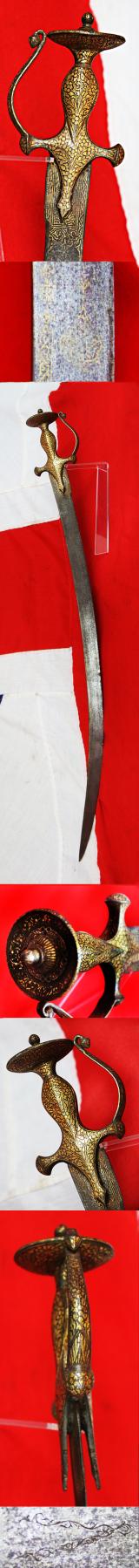 An I8-19th Century Damascus Gold Inlaid Hilted Sword, A Mughal Nobleman's Tulwar. From the Punjab Region, Likely Lahore. A Beautiful Sword Of Combat Perfection Combined With Status