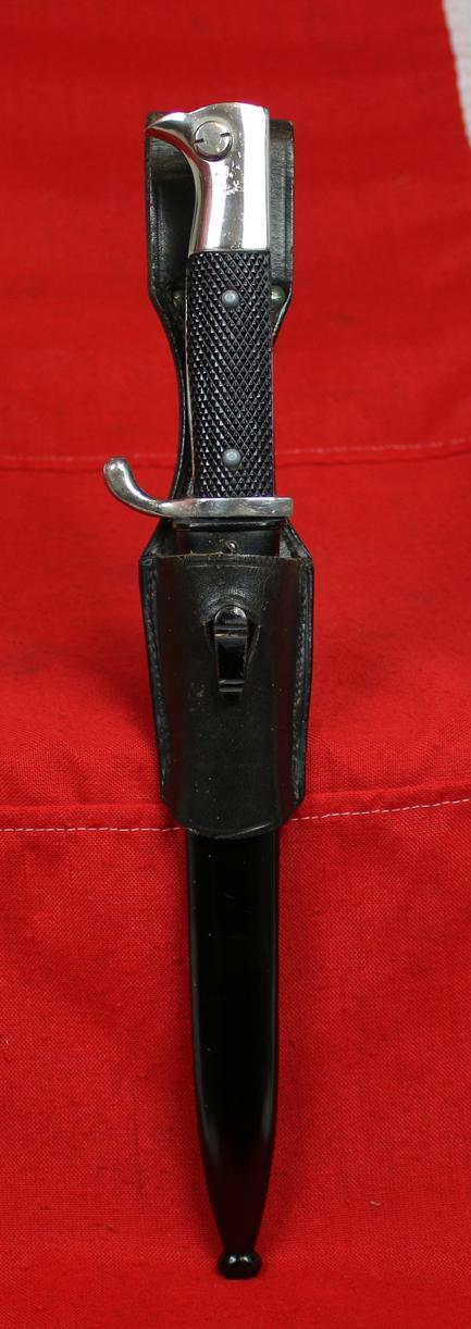 A Near Mint WW2 Third Reich German Machinegunners Close Combat Knife / Bayonet For Heer & Waffen SS, Complete With Its Original Frog Belt Mount Also In Near Mint Condition