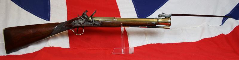A Rare and Absolutely Spectacular, J. & W. Richards, All-Brass Flintlock Blunderbuss With Sprung Top Mounted Bayonet. Finest 'Juglans Regia' Walnut Stock. Circa 1800. Much Favoured by Ship's Captains
