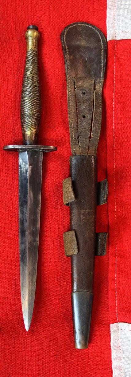A Fabulous, WW2 Special Forces, 1942 Issue, 'B2' Broad Arrow Marked Early Second Pattern FS Commando Knife. With 'Hand Ground' Blued Finish Blade & Original Leather Scabbard In Great Service-Used Condition