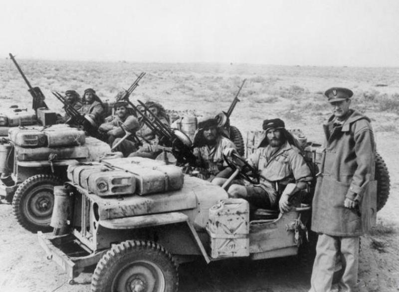 A Fabulous, WW2 Special Forces, 1942 Issue, 'B2' Broad Arrow Marked Early Second Pattern FS Commando Knife. With 'Hand Ground' Blued Finish Blade & Original Leather Scabbard In Great Service-Used Condition