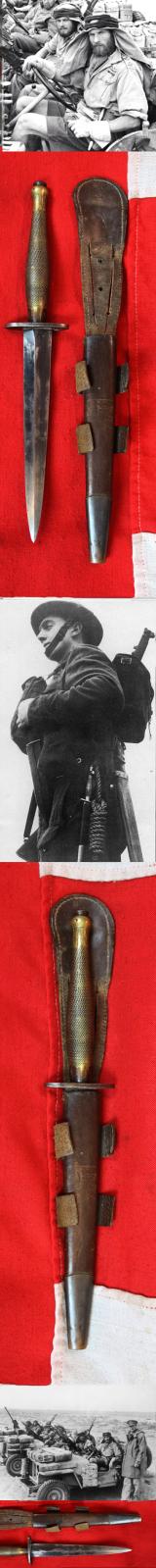 A Fabulous, WW2 Special Forces, 1942 Issue, 'B2' Broad Arrow Marked Early Second Pattern FS Commando Knife. With 'Hand Ground' Blued Finish Blade & Original Leather Scabbard In Great Service-Used Condition