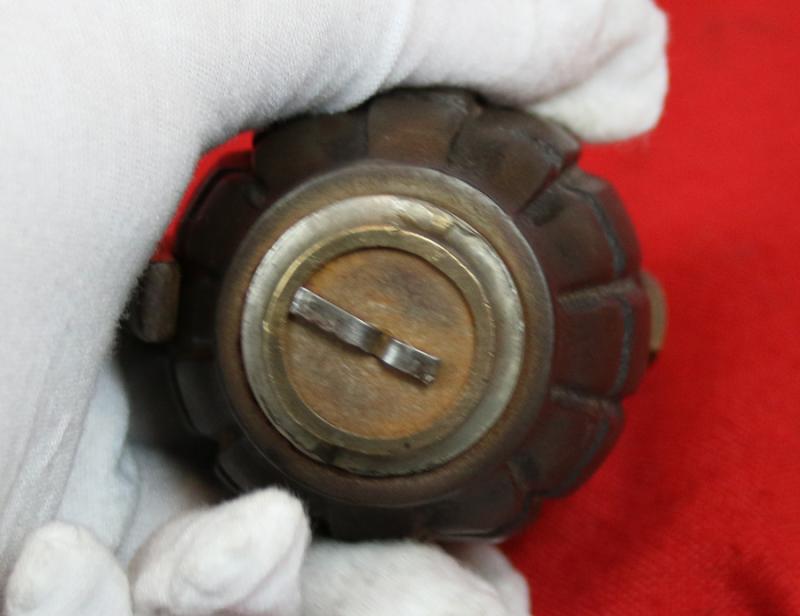 An Original, Inert, WW2 Service Issue British 'Mills Bomb' Grenade. Maker Stamped, I.B.R. by The Maker IBR {Ideal Boilers and Radiators} Ltd. Fitted With Automata Action