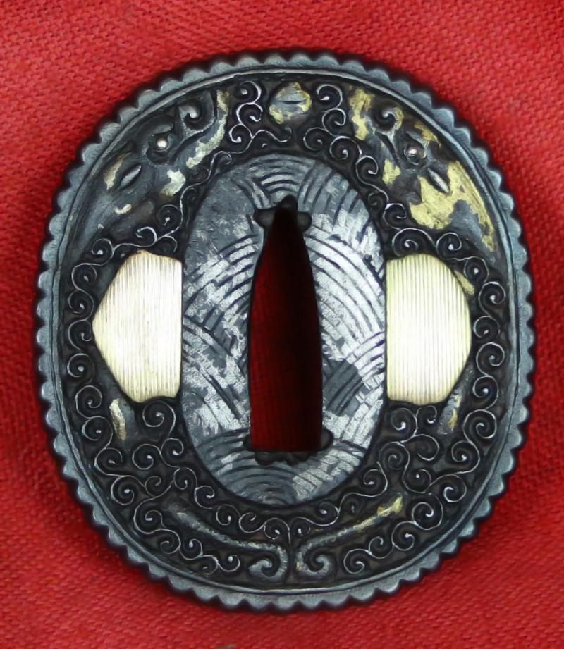 A Beautiful Quality Nanban Tsuba of Flying Dragons Over Scrolling Clouds With Gold Work. It Is Simply Breathtaking in its Beauty And Craftsmanship.
