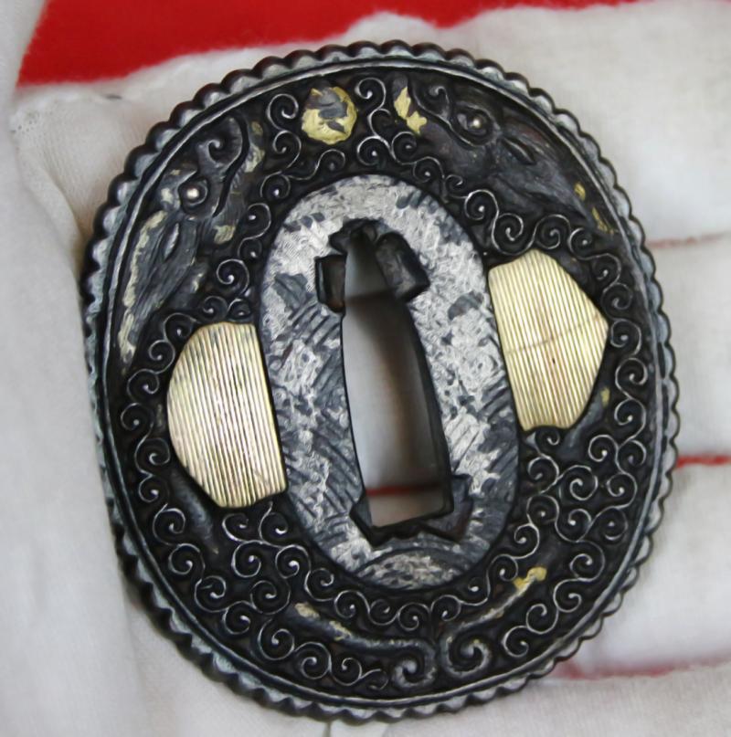 A Beautiful Quality Nanban Tsuba of Flying Dragons Over Scrolling Clouds With Gold Work. It Is Simply Breathtaking in its Beauty And Craftsmanship.