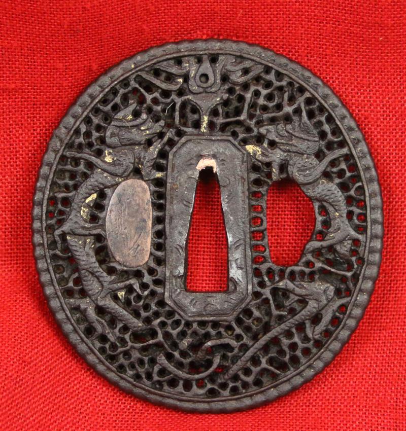 Openwork Iron Nanban Tsuba With A Pair of Dragons and Golden Nunome-Zogan Decor. A Most Fine Japanese 17th Century Sword Guard