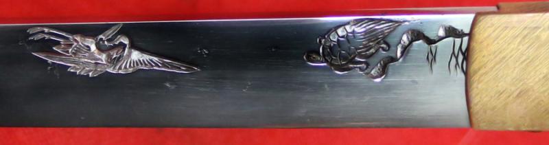 A Stunningly Beautiful, Signed,16th-17th Century Koto-Shinto Aikuchi Tanto, The Kunitsugu School, With Carved Horimono of a Crane and a Minogame Turtle,