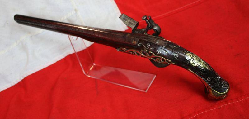 A Superb Corsairs Pirate Pistol. An I8th Century Long Flintlock, Italianate Style. Very Fine Quality Mounts and Engraving From The Mediterranean Region, as Used Throughout the Seven Seas From the Golden Age of Piracy.