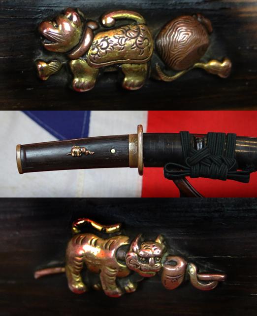 Beautiful Shinto Samurai Folklore Tanto, 1600, With A Wonderful Suite Of Copper Koshirae Engraved With Japanese Legendary Noh Tales. Figures of Folklore Including, Sanbaso, Samurai, Kappa & Yokai The Turtle & Human Face Octopus, Lamp, Fans & Cricket
