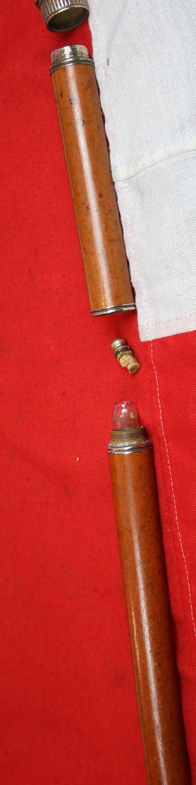 A Beautiful Victorian Hidden Gadget System Cane, Known As the Toulouse-Lautrec Cane. In Carved Mallacca Wood