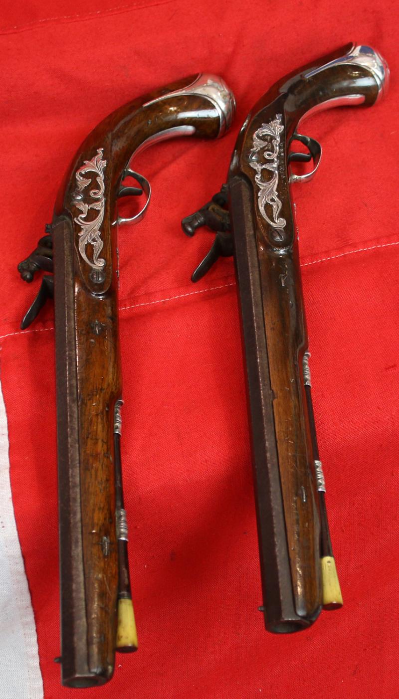 A Magnificent Pair of 18th Century London, Silver Mounted Long Holster Pistols Circa 1720, By George Halfhide of The Minories London. Elected Master of the London Gunmakers Company in 1736