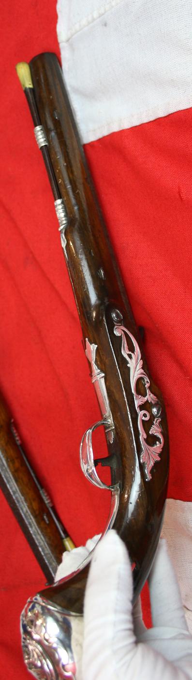A Magnificent Pair of 18th Century London, Silver Mounted Long Holster Pistols Circa 1720, By George Halfhide of The Minories London. Elected Master of the London Gunmakers Company in 1736
