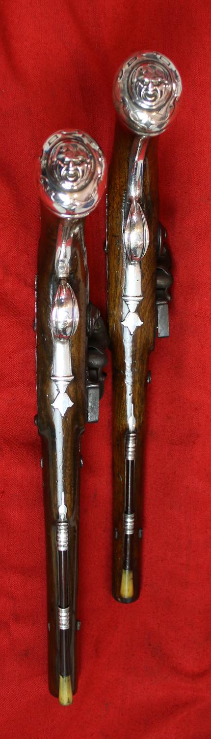 A Magnificent Pair of 18th Century London, Silver Mounted Long Holster Pistols Circa 1720, By George Halfhide of The Minories London. Elected Master of the London Gunmakers Company in 1736