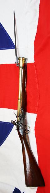 A Superb Royal Naval, Brass Cannon Barrel Blunderbuss With Finest 'Juglans Regia' Walnut Stock Spring Bayonet, Elaborately Engraved All Brass Furniture, by Daykin of Nottingham