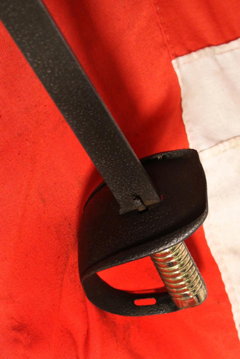 An Antique 19th Century, Victorian, Naval Ship's Cutlass Iron Bowl With Steel Blade and Cast Ribbed Brass Grip